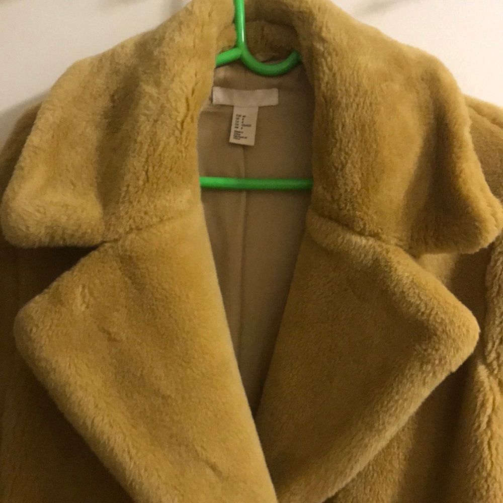 Warm cozy coat. New without tags never worn